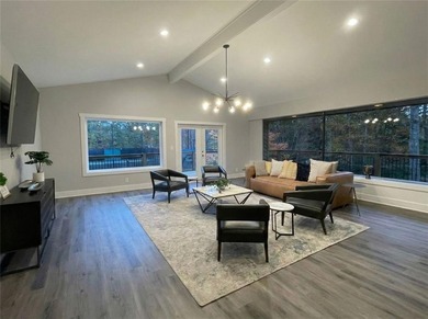 Step into this beautifully sun-filled home and experience the on Rivermont Golf and Country Club in Georgia - for sale on GolfHomes.com, golf home, golf lot