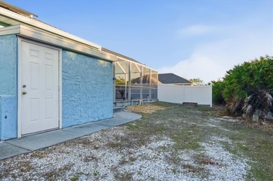 Tropical Paradise Living - No HOA!  ** THE FENCE IN THE BACK IS on Duffys Golf Center in Florida - for sale on GolfHomes.com, golf home, golf lot