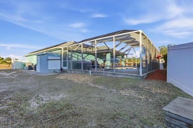 Tropical Paradise Living - No HOA!  ** THE FENCE IN THE BACK IS on Duffys Golf Center in Florida - for sale on GolfHomes.com, golf home, golf lot