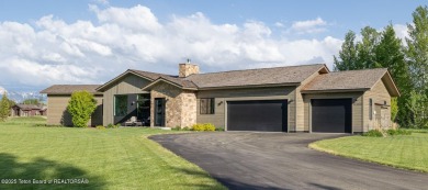 This contemporary home, nestled along the 7th fairway of the on Jackson Hole Golf and Tennis Club in Wyoming - for sale on GolfHomes.com, golf home, golf lot