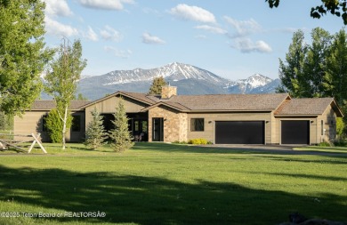 This contemporary home, nestled along the 7th fairway of the on Jackson Hole Golf and Tennis Club in Wyoming - for sale on GolfHomes.com, golf home, golf lot