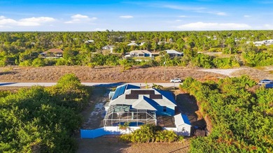 Tropical Paradise Living - No HOA!  ** THE FENCE IN THE BACK IS on Duffys Golf Center in Florida - for sale on GolfHomes.com, golf home, golf lot