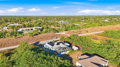 Tropical Paradise Living - No HOA!  ** THE FENCE IN THE BACK IS on Duffys Golf Center in Florida - for sale on GolfHomes.com, golf home, golf lot