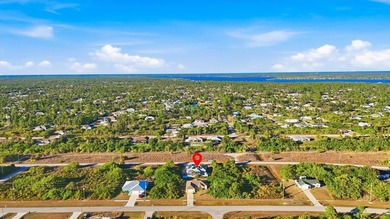 Tropical Paradise Living - No HOA!  ** THE FENCE IN THE BACK IS on Duffys Golf Center in Florida - for sale on GolfHomes.com, golf home, golf lot