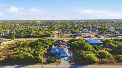 Tropical Paradise Living - No HOA!  ** THE FENCE IN THE BACK IS on Duffys Golf Center in Florida - for sale on GolfHomes.com, golf home, golf lot