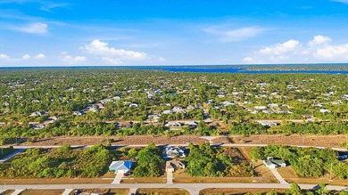 Tropical Paradise Living - No HOA!  ** THE FENCE IN THE BACK IS on Duffys Golf Center in Florida - for sale on GolfHomes.com, golf home, golf lot