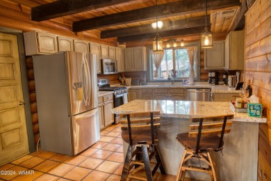 Fully Turnkey FURNISHED! This LOG CABIN, with rec. center on Pinetop Lakes Golf and Country Club in Arizona - for sale on GolfHomes.com, golf home, golf lot