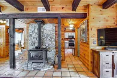 Fully Turnkey FURNISHED! This LOG CABIN, with rec. center on Pinetop Lakes Golf and Country Club in Arizona - for sale on GolfHomes.com, golf home, golf lot
