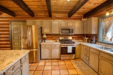 Fully Turnkey FURNISHED! This LOG CABIN, with rec. center on Pinetop Lakes Golf and Country Club in Arizona - for sale on GolfHomes.com, golf home, golf lot