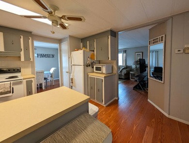 Before I forget to say it,  the GOLF CART comes with the home! on Grasslands Golf and Country Club in Florida - for sale on GolfHomes.com, golf home, golf lot