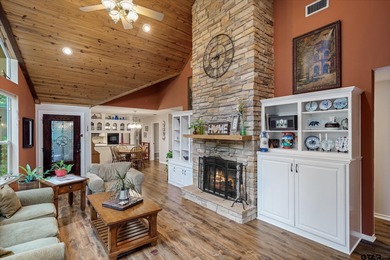 An absolute 3/3/2+ dream home in highly sought after gated on Holly Lake Ranch Golf Club in Texas - for sale on GolfHomes.com, golf home, golf lot