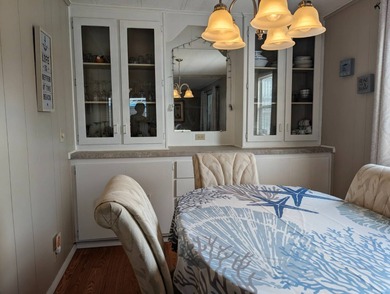 Before I forget to say it,  the GOLF CART comes with the home! on Grasslands Golf and Country Club in Florida - for sale on GolfHomes.com, golf home, golf lot