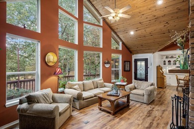 An absolute 3/3/2+ dream home in highly sought after gated on Holly Lake Ranch Golf Club in Texas - for sale on GolfHomes.com, golf home, golf lot