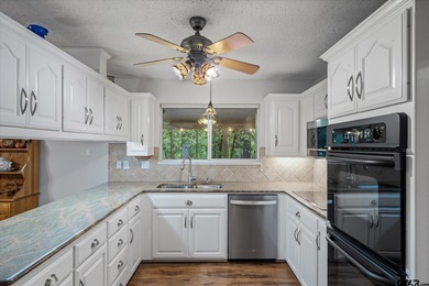 An absolute 3/3/2+ dream home in highly sought after gated on Holly Lake Ranch Golf Club in Texas - for sale on GolfHomes.com, golf home, golf lot