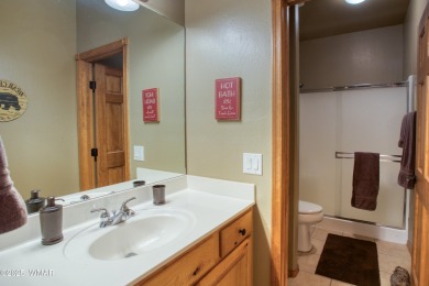 Escape to this charming 2-bedroom, 2-bath cabin nestled in the on Torreon Golf Club in Arizona - for sale on GolfHomes.com, golf home, golf lot