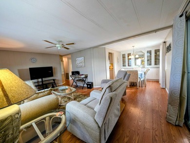 Before I forget to say it,  the GOLF CART comes with the home! on Grasslands Golf and Country Club in Florida - for sale on GolfHomes.com, golf home, golf lot