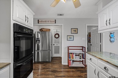 An absolute 3/3/2+ dream home in highly sought after gated on Holly Lake Ranch Golf Club in Texas - for sale on GolfHomes.com, golf home, golf lot