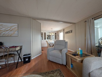 Before I forget to say it,  the GOLF CART comes with the home! on Grasslands Golf and Country Club in Florida - for sale on GolfHomes.com, golf home, golf lot