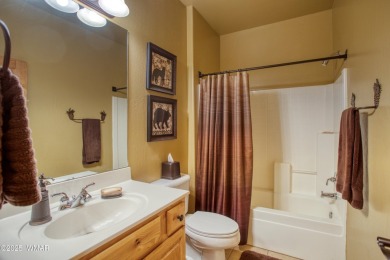 Escape to this charming 2-bedroom, 2-bath cabin nestled in the on Torreon Golf Club in Arizona - for sale on GolfHomes.com, golf home, golf lot