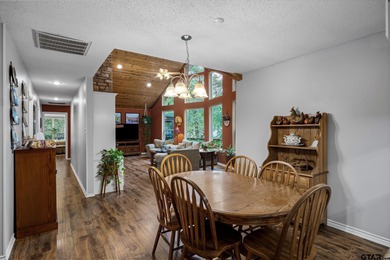 An absolute 3/3/2+ dream home in highly sought after gated on Holly Lake Ranch Golf Club in Texas - for sale on GolfHomes.com, golf home, golf lot