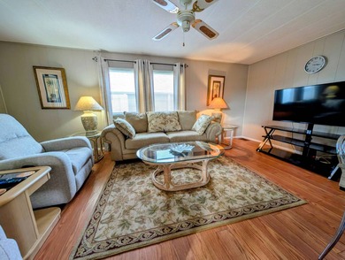 Before I forget to say it,  the GOLF CART comes with the home! on Grasslands Golf and Country Club in Florida - for sale on GolfHomes.com, golf home, golf lot