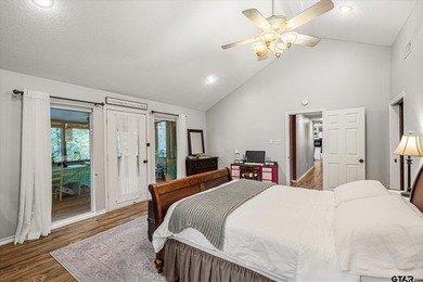 An absolute 3/3/2+ dream home in highly sought after gated on Holly Lake Ranch Golf Club in Texas - for sale on GolfHomes.com, golf home, golf lot