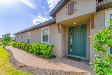 Step into paradise at 3025 Veneto Court, an upgraded on Esplanade Golf and Country at Lakewood Ranch in Florida - for sale on GolfHomes.com, golf home, golf lot