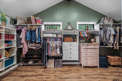 An absolute 3/3/2+ dream home in highly sought after gated on Holly Lake Ranch Golf Club in Texas - for sale on GolfHomes.com, golf home, golf lot