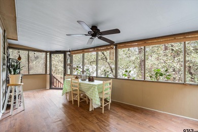 An absolute 3/3/2+ dream home in highly sought after gated on Holly Lake Ranch Golf Club in Texas - for sale on GolfHomes.com, golf home, golf lot