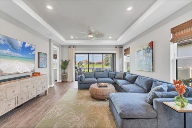 Step into paradise at 3025 Veneto Court, an upgraded on Esplanade Golf and Country at Lakewood Ranch in Florida - for sale on GolfHomes.com, golf home, golf lot