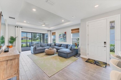 Step into paradise at 3025 Veneto Court, an upgraded on Esplanade Golf and Country at Lakewood Ranch in Florida - for sale on GolfHomes.com, golf home, golf lot