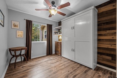 An absolute 3/3/2+ dream home in highly sought after gated on Holly Lake Ranch Golf Club in Texas - for sale on GolfHomes.com, golf home, golf lot