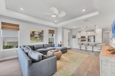 Step into paradise at 3025 Veneto Court, an upgraded on Esplanade Golf and Country at Lakewood Ranch in Florida - for sale on GolfHomes.com, golf home, golf lot