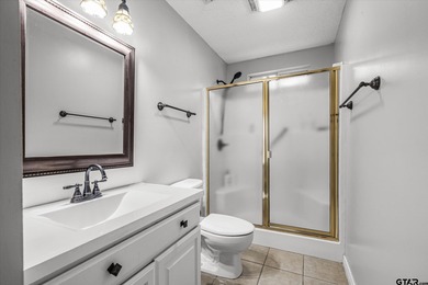 An absolute 3/3/2+ dream home in highly sought after gated on Holly Lake Ranch Golf Club in Texas - for sale on GolfHomes.com, golf home, golf lot