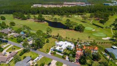 Simply stunning and spacious, custom home situated on a double on Holiday Golf Club in Florida - for sale on GolfHomes.com, golf home, golf lot