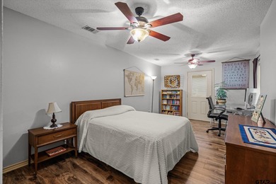 An absolute 3/3/2+ dream home in highly sought after gated on Holly Lake Ranch Golf Club in Texas - for sale on GolfHomes.com, golf home, golf lot