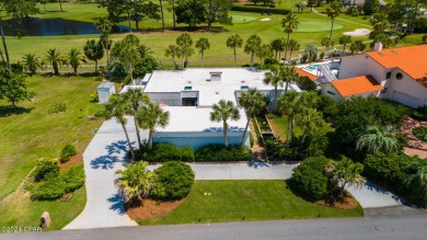 Simply stunning and spacious, custom home situated on a double on Holiday Golf Club in Florida - for sale on GolfHomes.com, golf home, golf lot