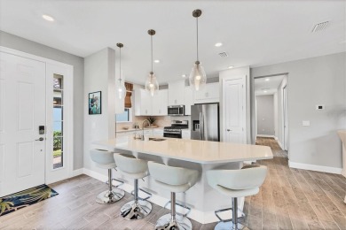 Step into paradise at 3025 Veneto Court, an upgraded on Esplanade Golf and Country at Lakewood Ranch in Florida - for sale on GolfHomes.com, golf home, golf lot