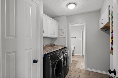 An absolute 3/3/2+ dream home in highly sought after gated on Holly Lake Ranch Golf Club in Texas - for sale on GolfHomes.com, golf home, golf lot