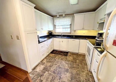 This home offers an incredible value & is situated on one of our on Del Tura Golf and Country Club in Florida - for sale on GolfHomes.com, golf home, golf lot