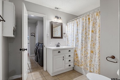 An absolute 3/3/2+ dream home in highly sought after gated on Holly Lake Ranch Golf Club in Texas - for sale on GolfHomes.com, golf home, golf lot