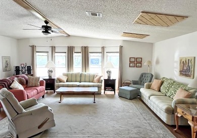 This home offers an incredible value & is situated on one of our on Del Tura Golf and Country Club in Florida - for sale on GolfHomes.com, golf home, golf lot