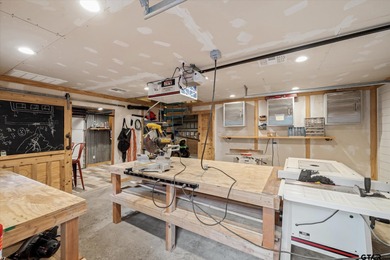 An absolute 3/3/2+ dream home in highly sought after gated on Holly Lake Ranch Golf Club in Texas - for sale on GolfHomes.com, golf home, golf lot