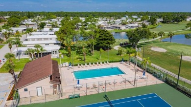 This 1979 two bedroom, two bathroom home may be the perfect on Maple Leaf Golf and Country Club in Florida - for sale on GolfHomes.com, golf home, golf lot