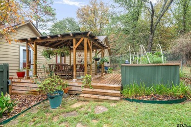 An absolute 3/3/2+ dream home in highly sought after gated on Holly Lake Ranch Golf Club in Texas - for sale on GolfHomes.com, golf home, golf lot