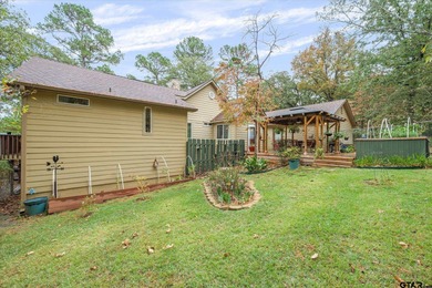 An absolute 3/3/2+ dream home in highly sought after gated on Holly Lake Ranch Golf Club in Texas - for sale on GolfHomes.com, golf home, golf lot