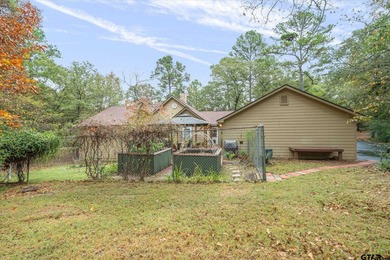 An absolute 3/3/2+ dream home in highly sought after gated on Holly Lake Ranch Golf Club in Texas - for sale on GolfHomes.com, golf home, golf lot