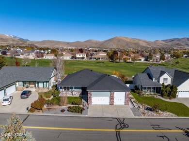 Discover this bright and inviting single-story home tucked along on Silver Oak Golf Course in Nevada - for sale on GolfHomes.com, golf home, golf lot