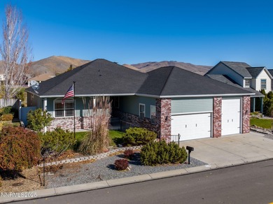 Discover this bright and inviting single-story home tucked along on Silver Oak Golf Course in Nevada - for sale on GolfHomes.com, golf home, golf lot