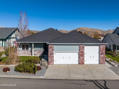Discover this bright and inviting single-story home tucked along on Silver Oak Golf Course in Nevada - for sale on GolfHomes.com, golf home, golf lot
